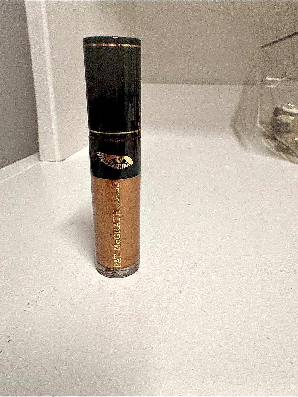 Pat McGrath Labs FetishEYES Longwear Liquid Eye Shadow in “Bronze Bijoux.” It’s
